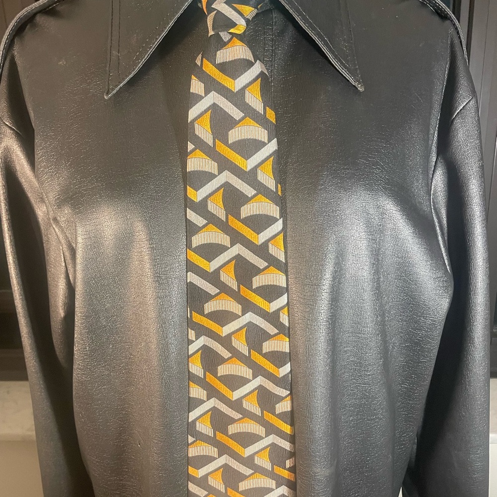 Halston tie with a geometric pattern